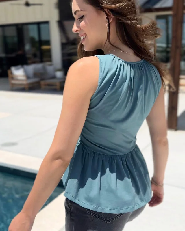 BARI peplum tank in Dark Aqua